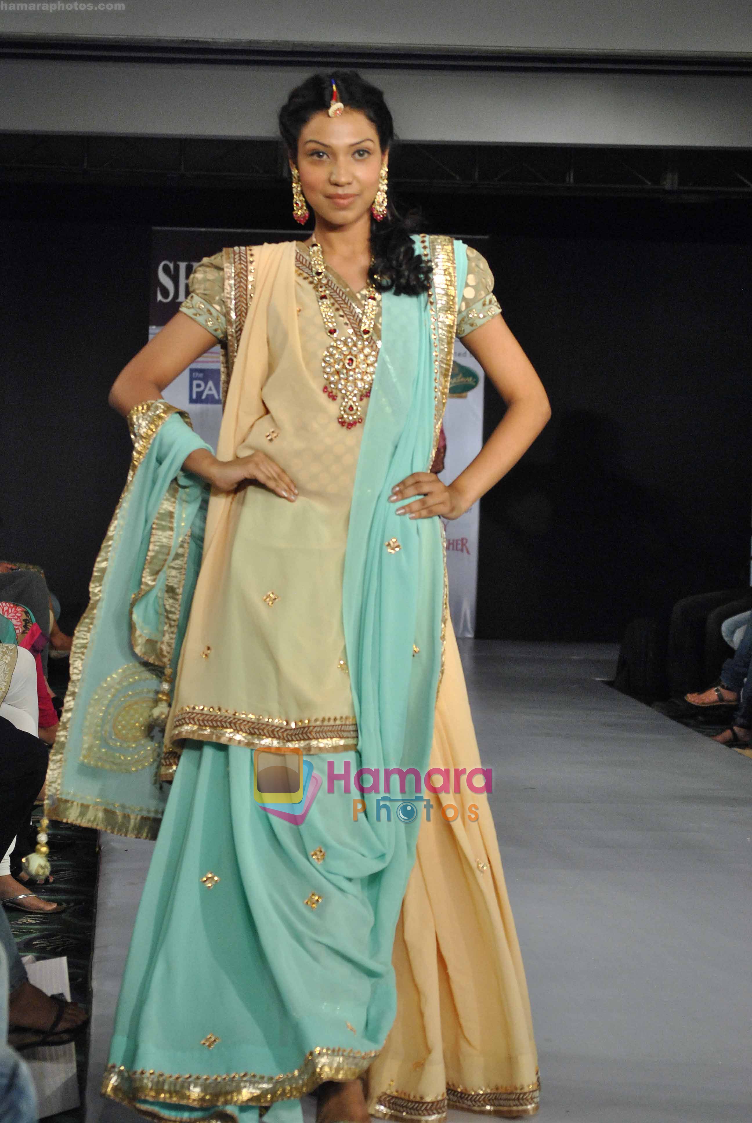 Model walk the ramp for Shruti Sancheti of PINNACLE at the Kolkata Couture Lifestyle Fashion Week on the 17th of April 2011