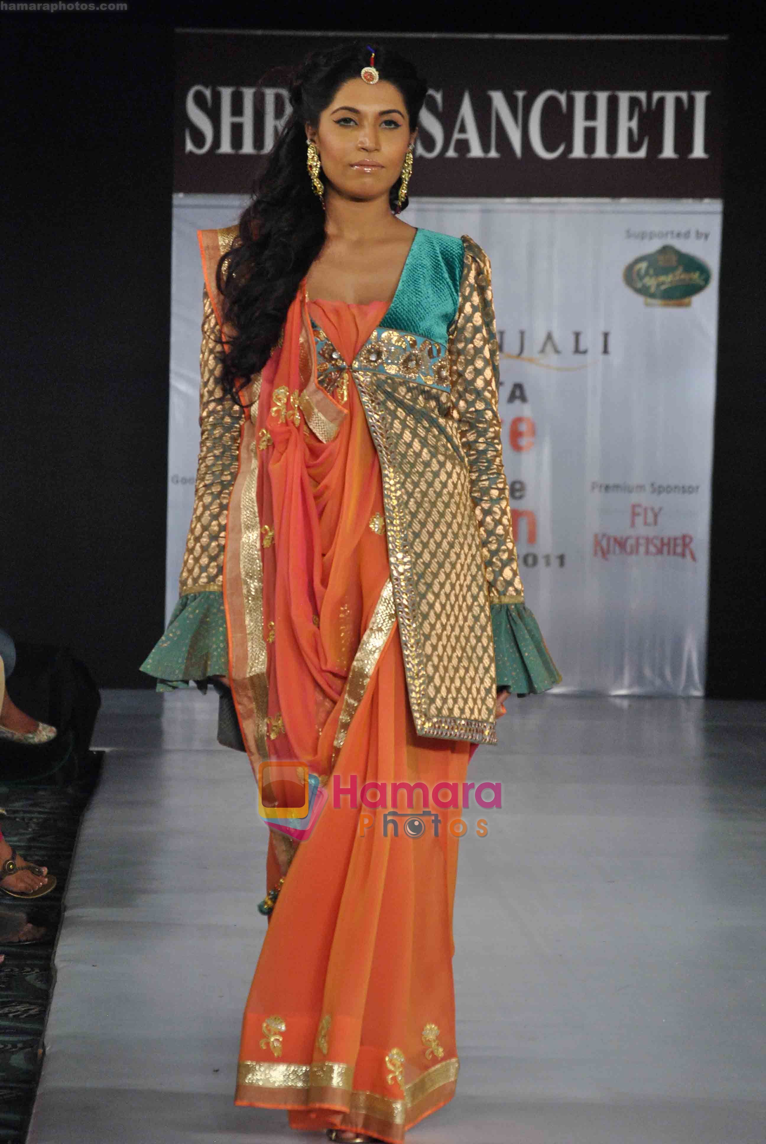 Model walk the ramp for Shruti Sancheti of PINNACLE at the Kolkata Couture Lifestyle Fashion Week on the 17th of April 2011 