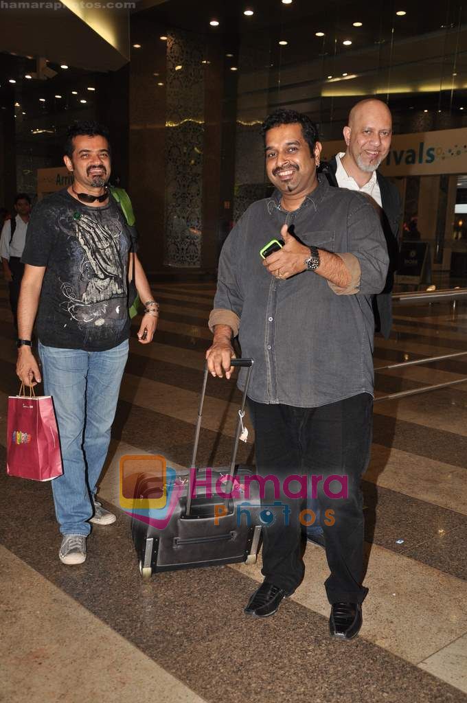 Shankar Ehsaan Loy return from IIFA Delhi press meet in Airport, Mumbai on 16th June 2011 