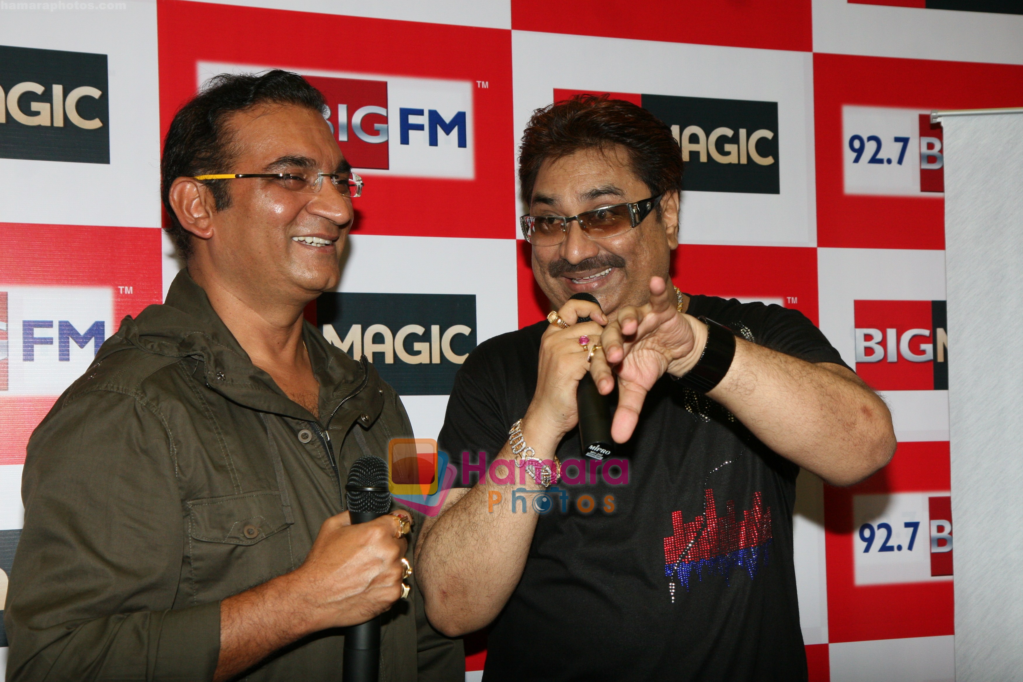 Abhijeet and Kumar Shanu hum along R D Burman's music at 92.7 Big FM in Mumbai, June 27, 2011