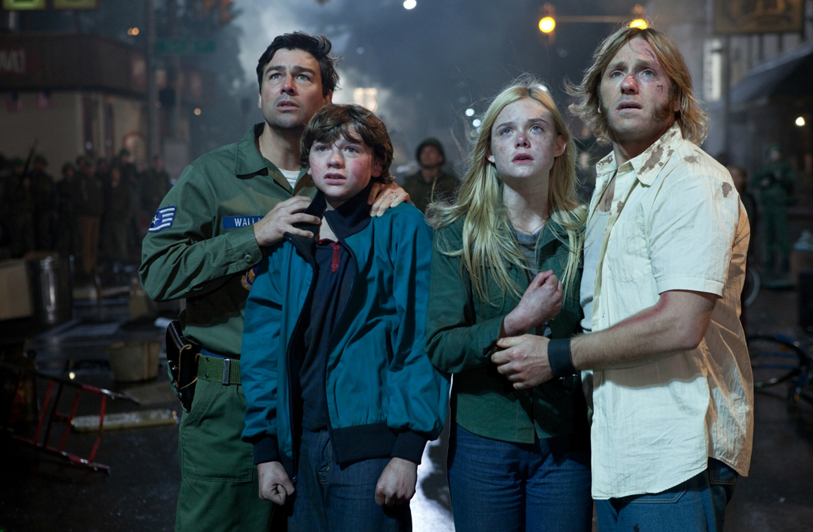 Kyle Chandler, Ron Eldard, Elle Fanning, Joel Courtney in the still from the movie Super 8 Eight