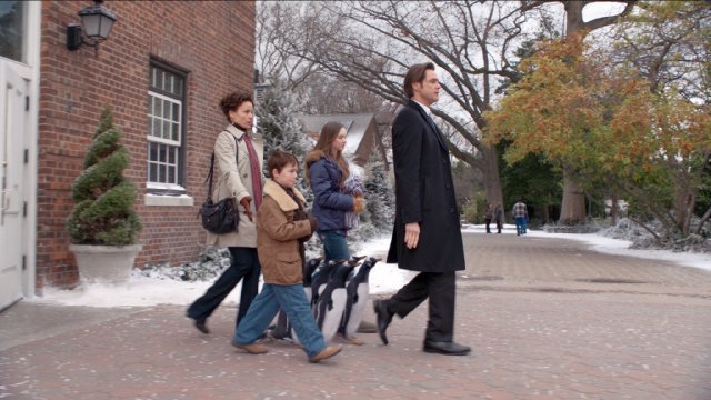 Jim Carrey, Carla Gugino, Madeline Carroll, Maxwell Perry Cotton in the still from the movie Mr. Poppers Penguins