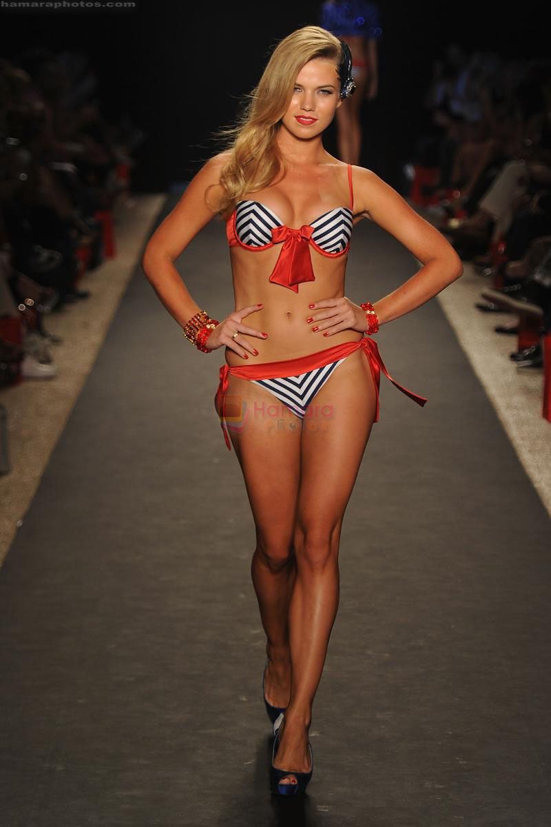 A model walks the runway at the Beach Bunny Swimwear show during Merecdes-Benz Fashion Week Swim 2012 at The Raleigh on July 15, 2011 in Miami Beach, Florida