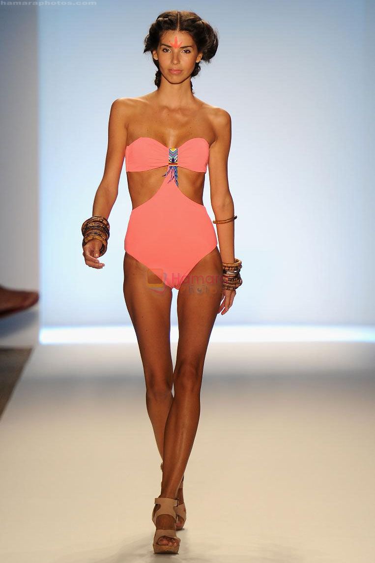 A model walks the runway at the Mara Hoffman Swim show during Mercedes-Benz Fashion Week Swim 2012 at The Raleigh on July 16, 2011 in Miami Beach, Florida