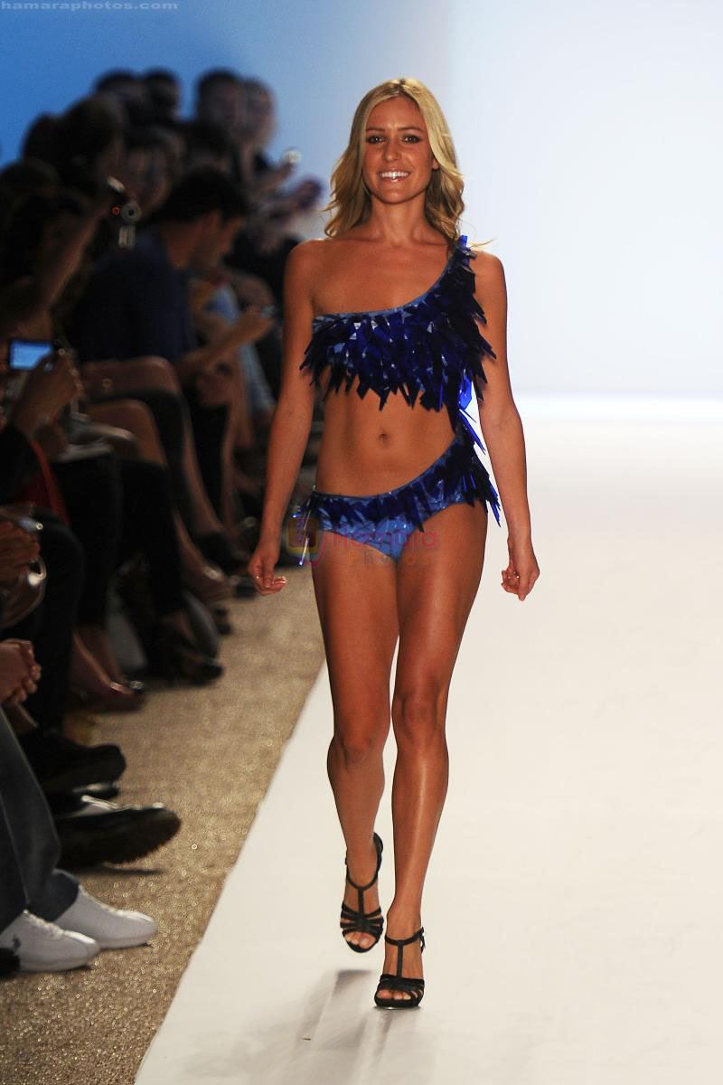 A model walks the runway for the Diesel show during Mercedes-Benz Fashion Week Swim at Raleigh Hotel on July 14, 2011 in Miami Beach, Florida