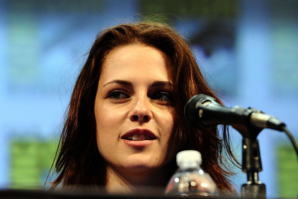 Kristen Stewart poses to promote Breaking Dawn from the Twilight Saga at  the 2011 Comic-Con International Day 1 at the San Diego Convention Center on July 21, 2011