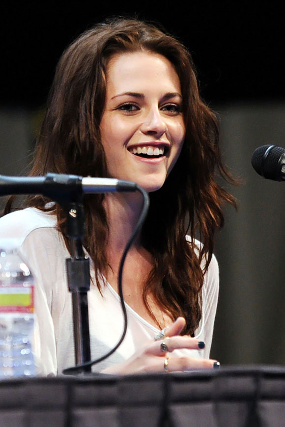 Kristen Stewart poses to promote Breaking Dawn from the Twilight Saga at  the 2011 Comic-Con International Day 1 at the San Diego Convention Center on July 21, 2011