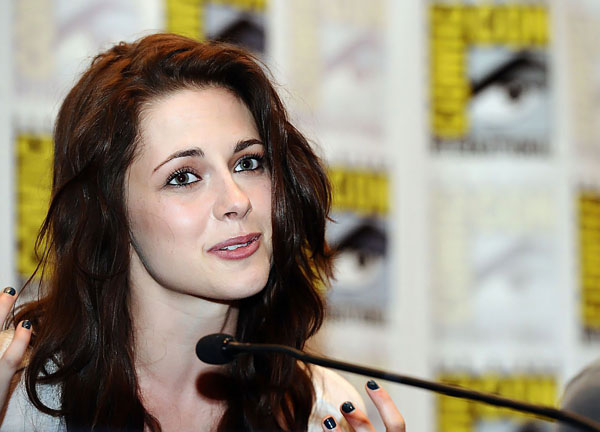 Kristen Stewart poses to promote Breaking Dawn from the Twilight Saga at  the 2011 Comic-Con International Day 1 at the San Diego Convention Center on July 21, 2011