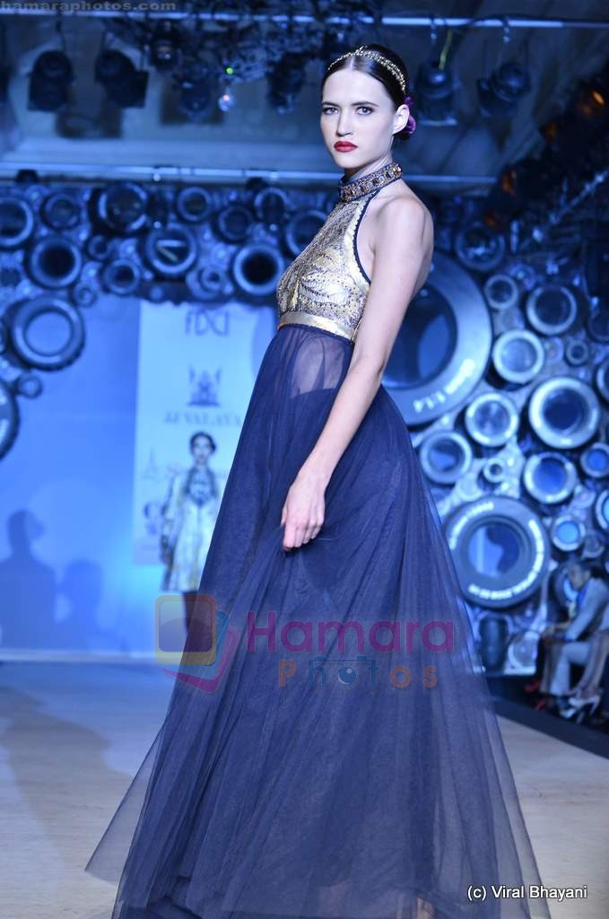 Model walk the ramp for JJ Valaya's fashion show at the Synergy1 Delhi Couture Week 2011 in Delhi on 22nd July 2011