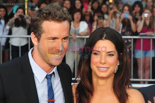 Ryan Reynolds and Sandra Bullock attends the LA premiere of the movie The Change-Up at the  Regency Village Theatre in Westwood, CA, USA on 1st August 2011