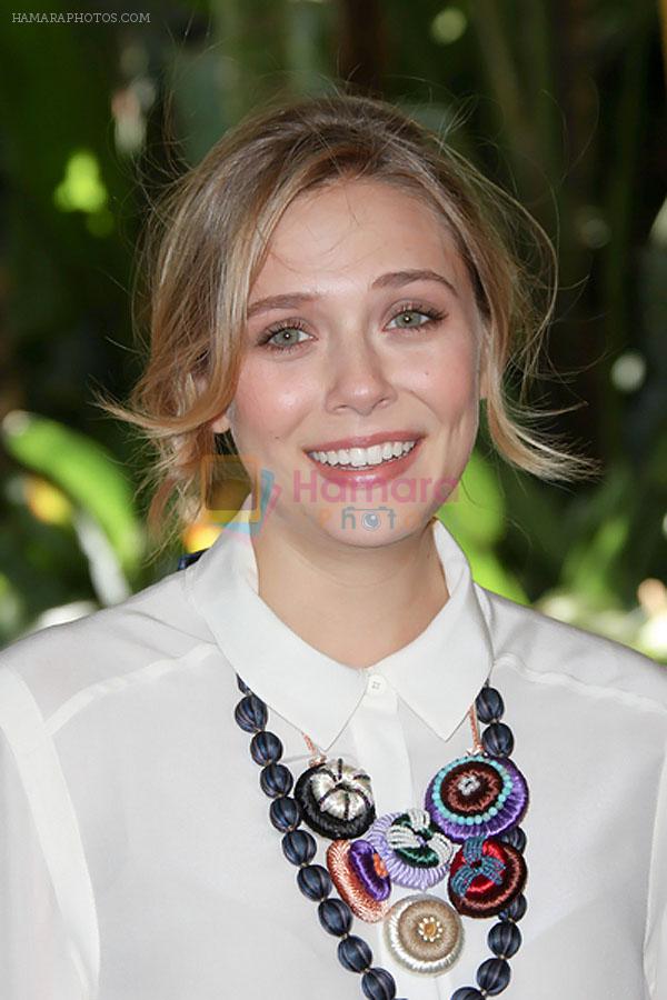 Elizabeth Olsen attends the 2011 Hollywood Foreign Press Association Annual Installation Luncheon in Beverly Hills Hotel, CA on 4th August 2011