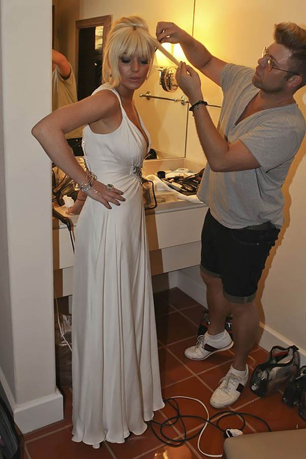 Lindsay Lohan getting ready for Kim Kardashian's wedding in Santa Barbara on August 20, 2011