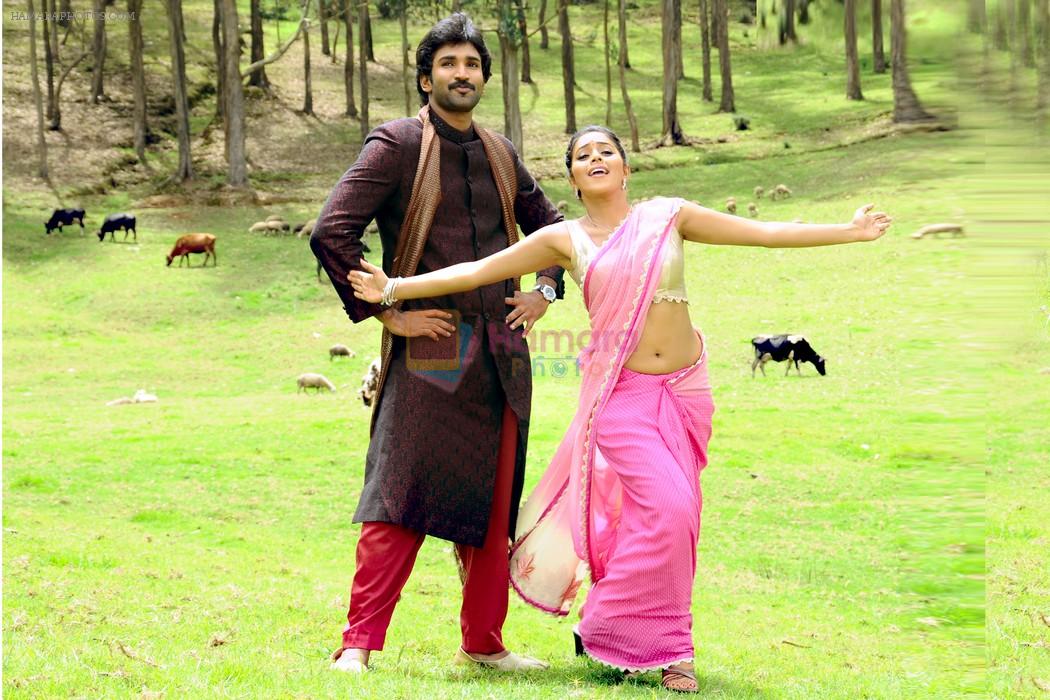 Shamna Kasim (Poorna), Sai Pradeep Pinisetty (Aadhi) in Chelagatam Movie Stills