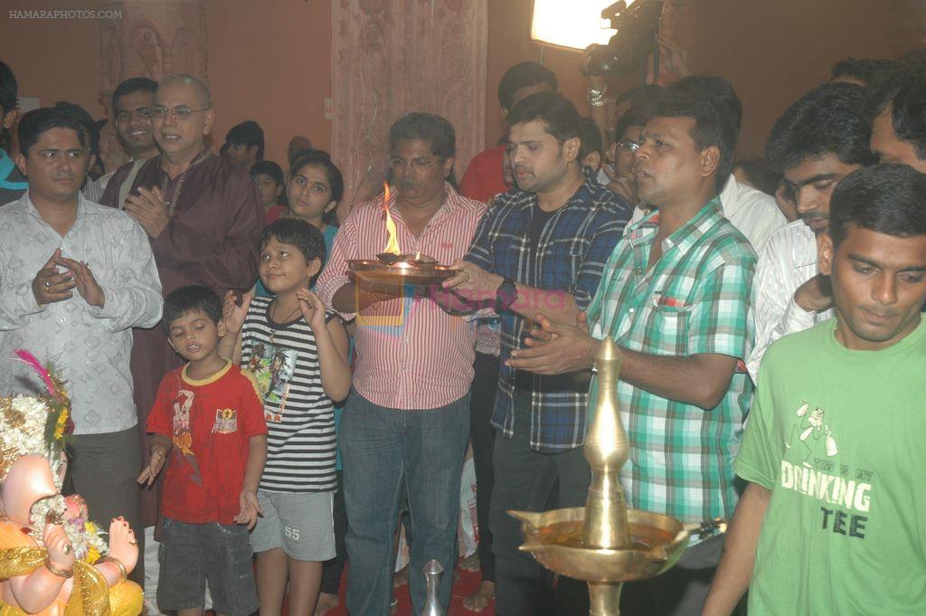 Himesh Reshammiya unveils the first look of his film Damadamm at Andheri Cha Raja on 2nd Aug 2011