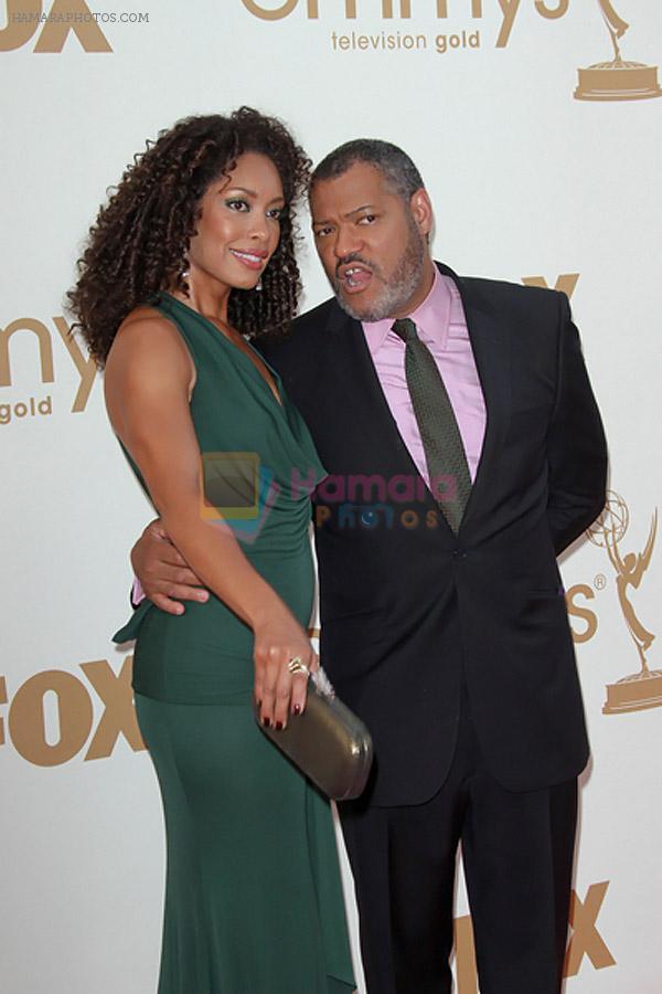 Laurence Fishburne and wife Gina Torres attends the 63rd Annual Primetime Emmy Awards in Nokia Theatre L.A. Live on 18th September 2011