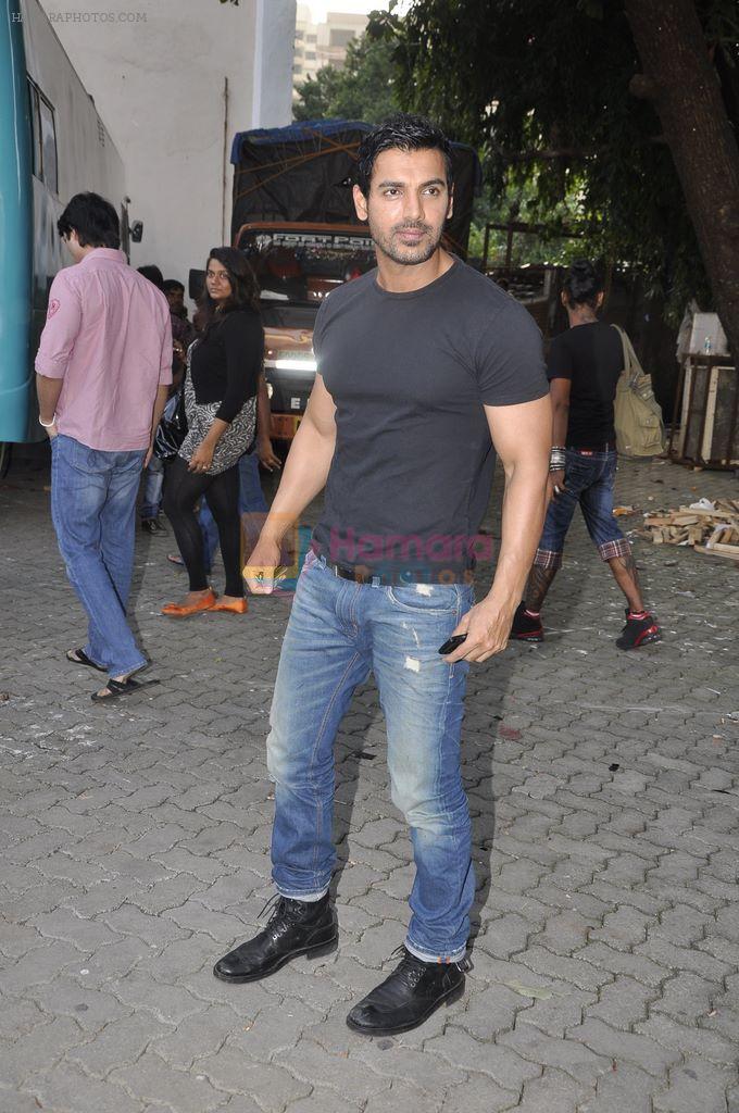 John abraham lifts a bike at Force Promotions in Mehboob, Mumbai on 27th Sep 2011
