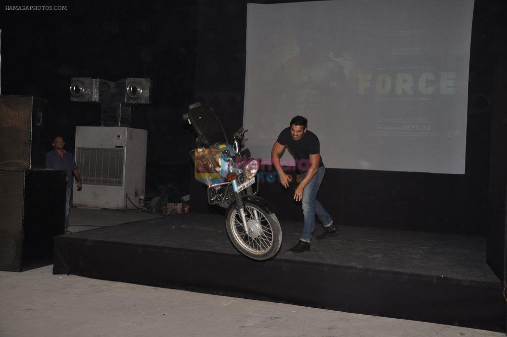 John abraham lifts a bike at Force Promotions in Mehboob, Mumbai on 27th Sep 2011