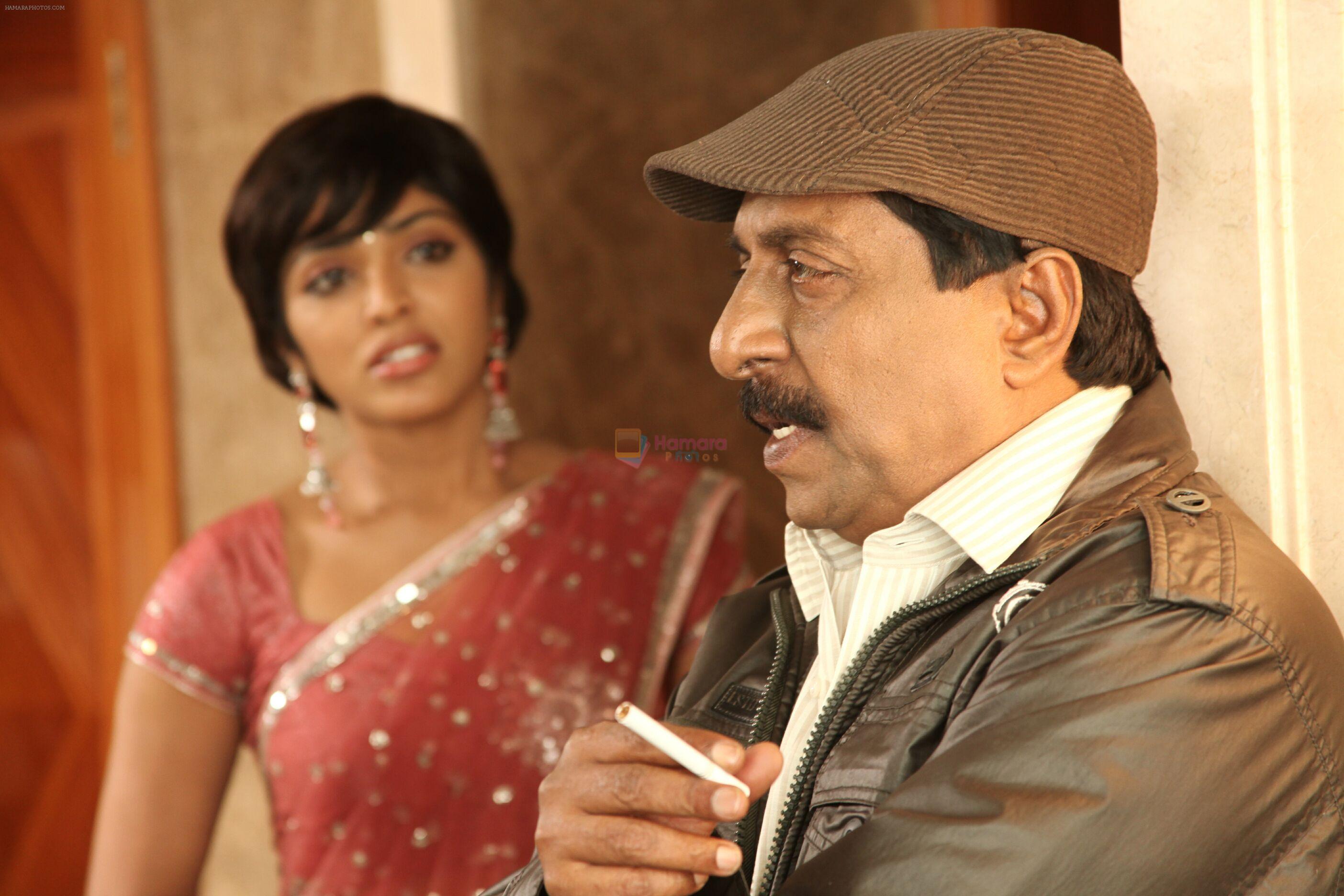 Rima Kallingal, Sreenivasan in Unnam Movie Stills