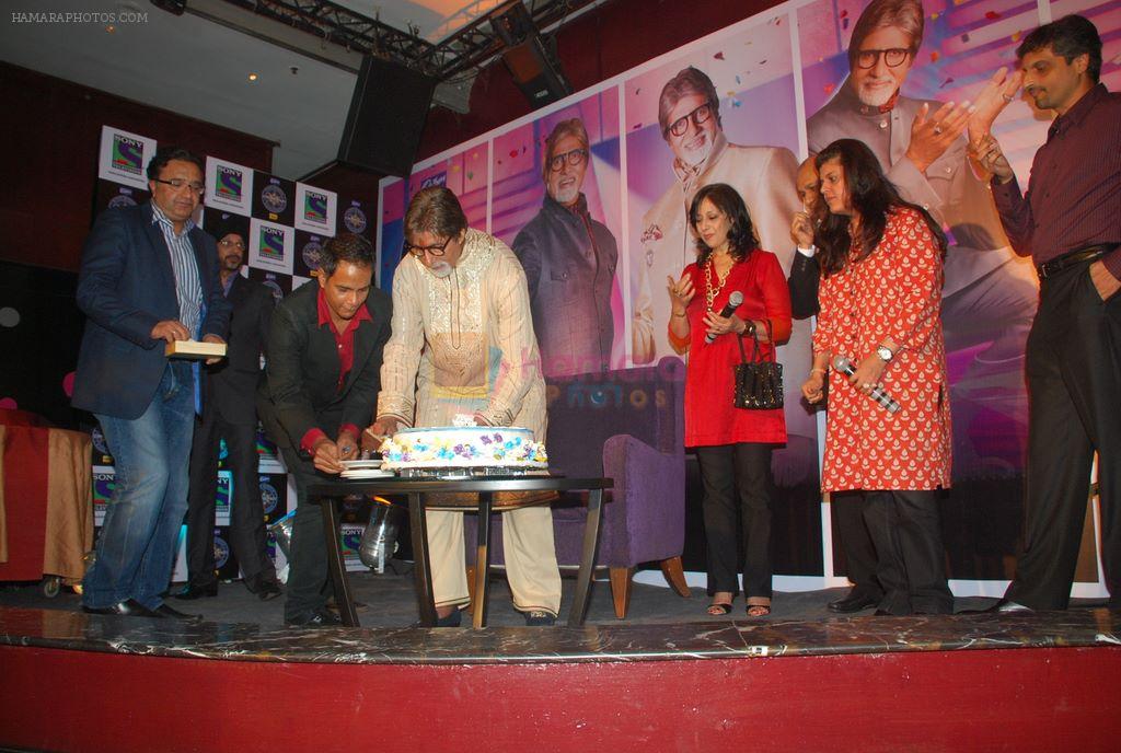 Amitabh Bachchan cuts his birthday cake at KBC bash in J W Marriott, Juhu, Mumbai on 11th Oct 2011