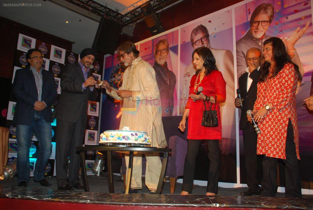 Amitabh Bachchan cuts his birthday cake at KBC bash in J W Marriott, Juhu, Mumbai on 11th Oct 2011