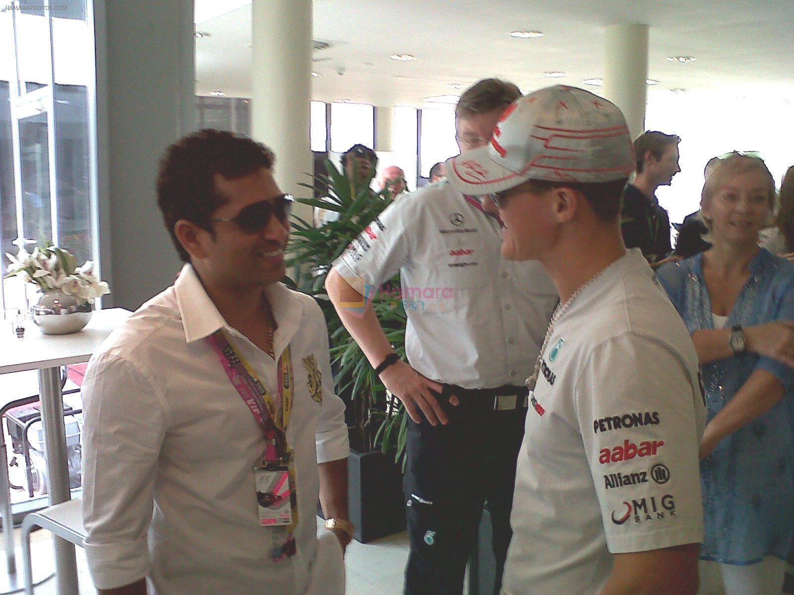 Sachin Tendulkar meets Michael Schumacher at Mercedes GP Petronas Team Building Area in Buddh International Curcuit on 30th Oct 2011