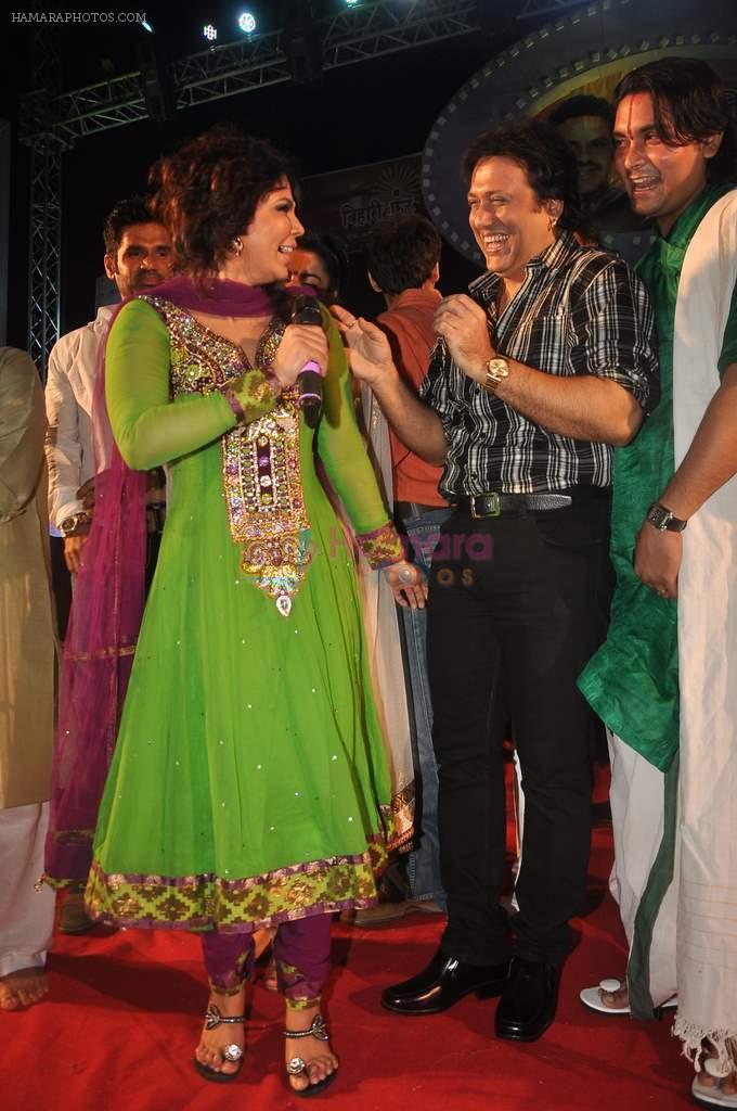 Rakhi Sawant, Govinda with the star cast of the film The Loot at Sanjay Nirupam's Chatt Pooja in Juhu Beach on 1st Nov 2011