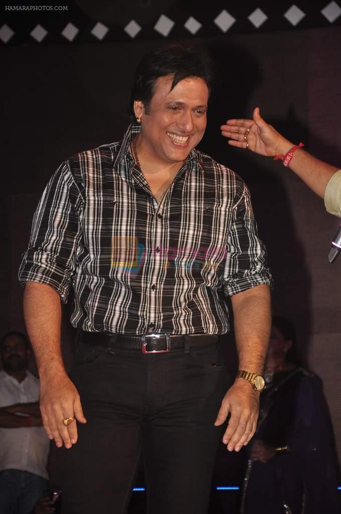 Govinda with the star cast of the film The Loot at Sanjay Nirupam's Chatt Pooja in Juhu Beach on 1st Nov 2011