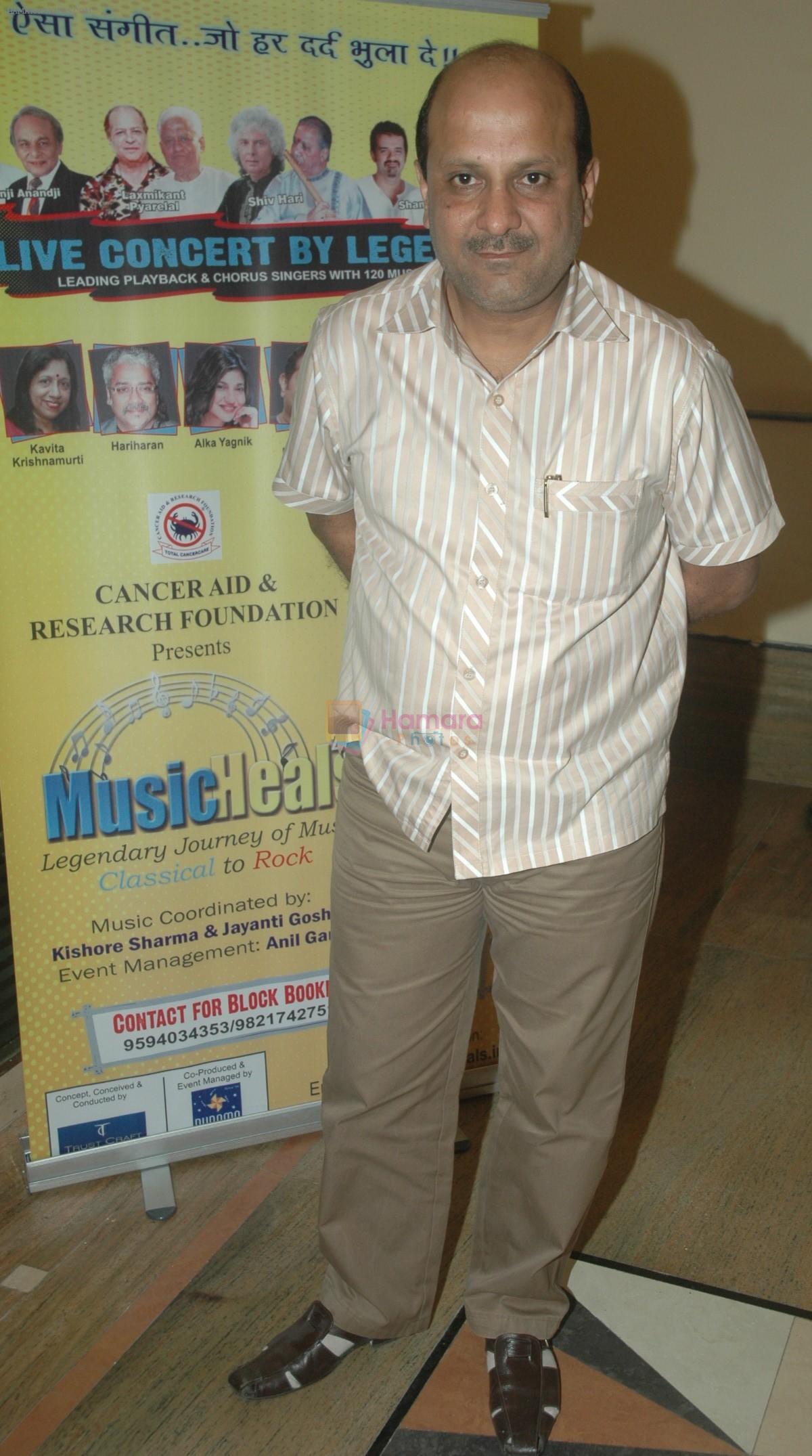 Anil Garg at the rehearsals for the Cancer Aid & Research Foundation's Music Heals 2011 with 100 live musicians under the Music Batonship of Jayanti Gosher & Kishore Sharma on 9th Nov 2011