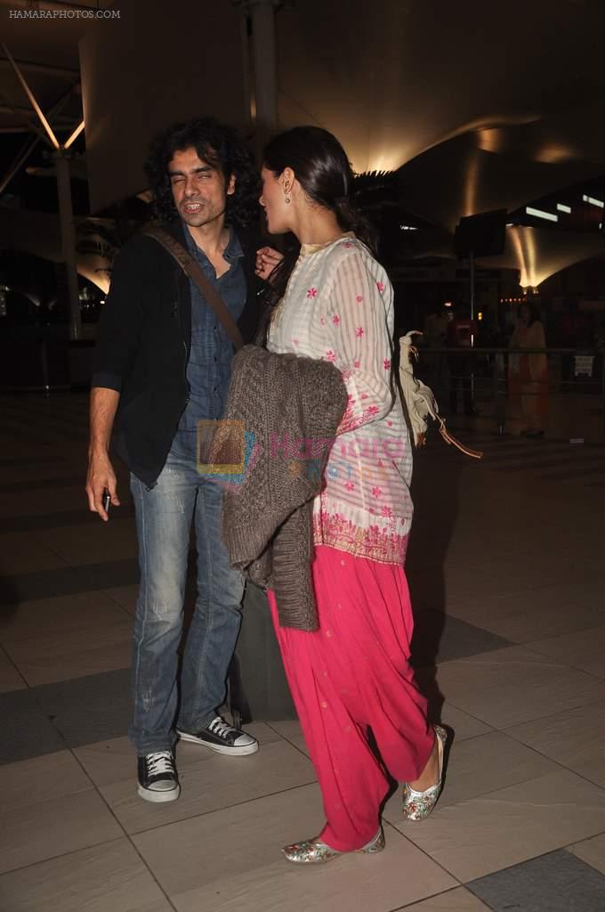 Imtiaz Ali, Nargis Fakhri snapped at the airport in Mumbai on 9th Nov 2011
