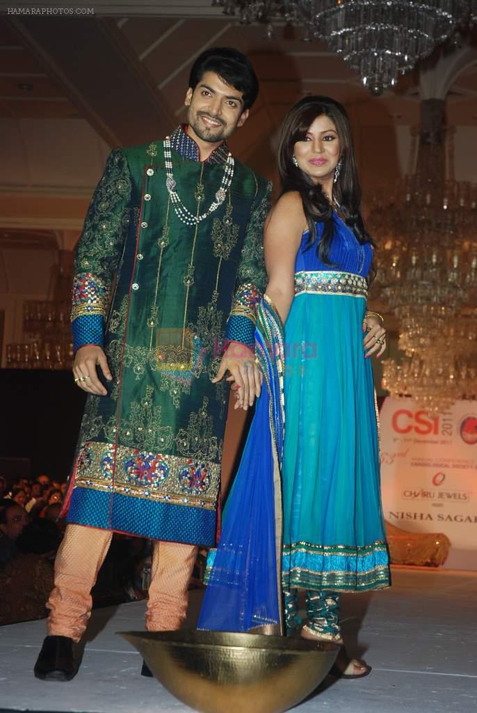 Debina and Gurmeet Chaudhary walk the ramp for Nisha Sagar's bridal show in Trident on 10th Dec 2011