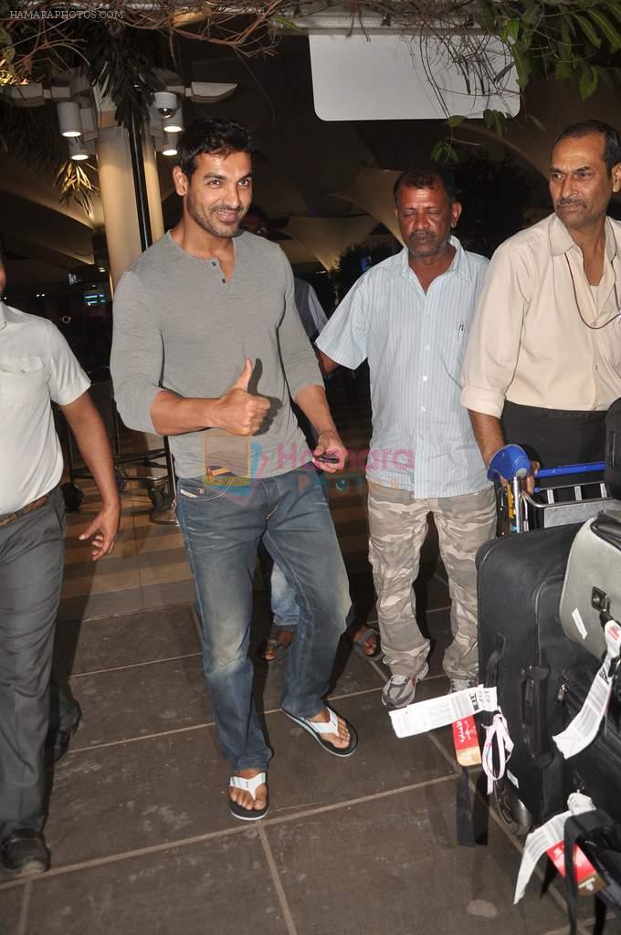 John Abraham snapped at the airport in Mumbai on 4th Jan 2012