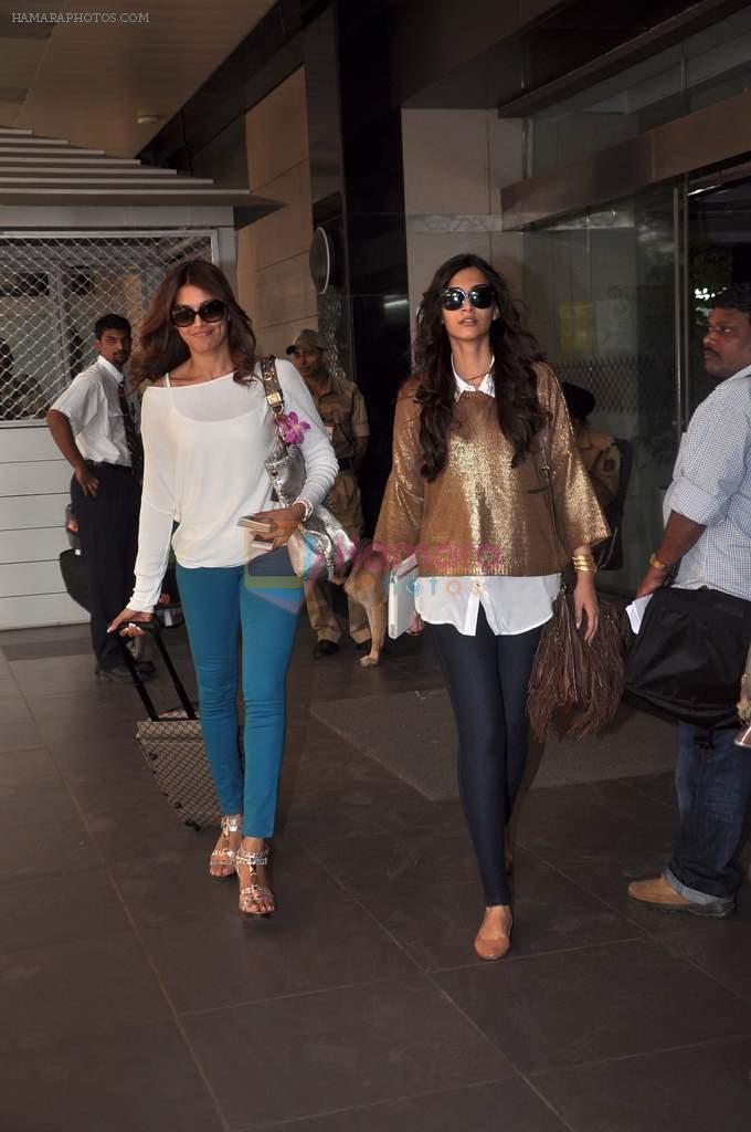 Bipasha Basu, Sonam Kapoor return from Dubai to Mumbai Airport on 5th Jan 2012