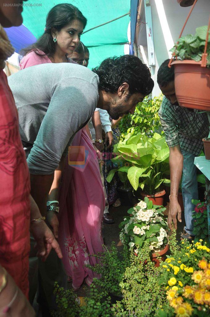 Farhan Akhtar plants a tree with Shaina NC in  Mumbai on 19th Jan 2012