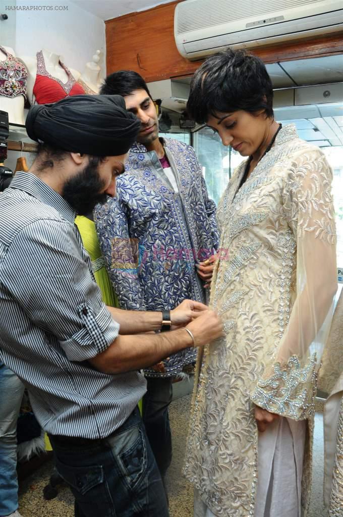 A D singh with Jesse at designer AD Singh store in Mumbai on 22nd Jan 2012