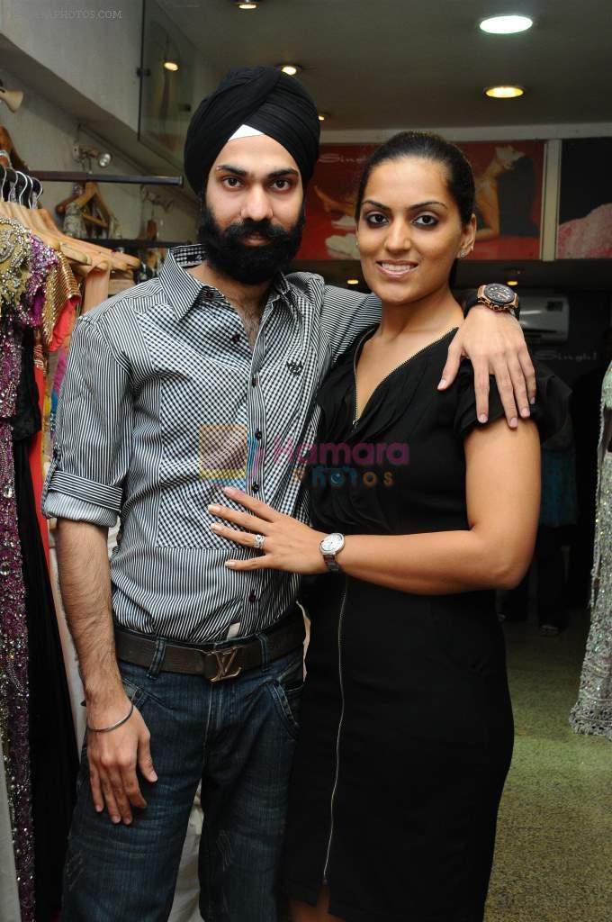 A D Singh with his wife at designer AD Singh store in Mumbai on 22nd Jan 2012