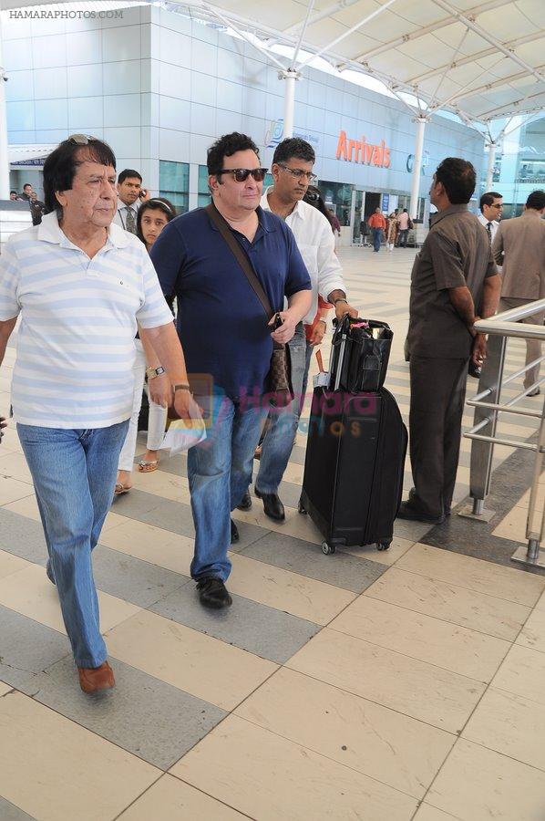 Rishi Kapoor return from Varun Dhawan's Wedding in Goa at Domestic Airport, Mumbai on 12th Feb 2012