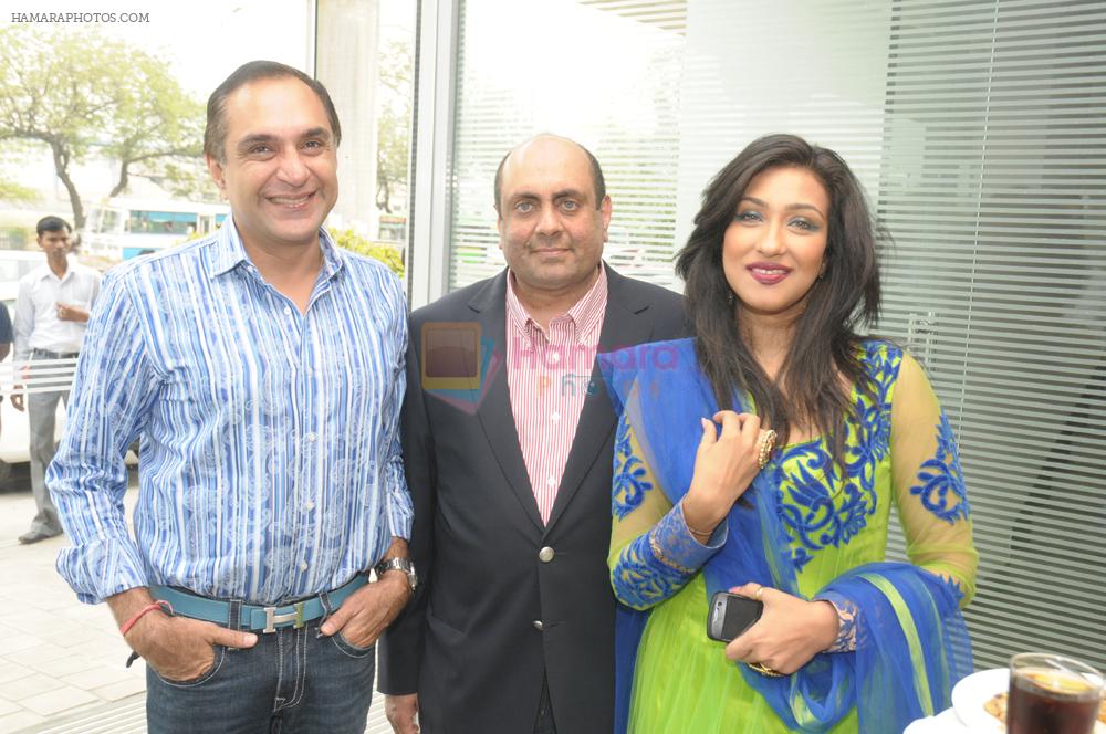 Desigenr Vijay Arora, Mr. Raghav Chandra and Ritu Parna Sen Gupta at audi delhi event in New Delhi on 25th March 2012