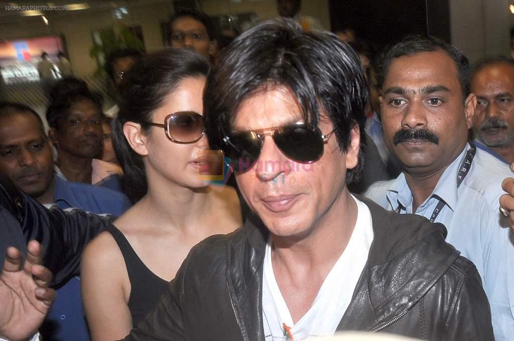 Shahrukh Khan, Katrina Kaif snapped at airport arrival in Mumbai on 27th March 2012