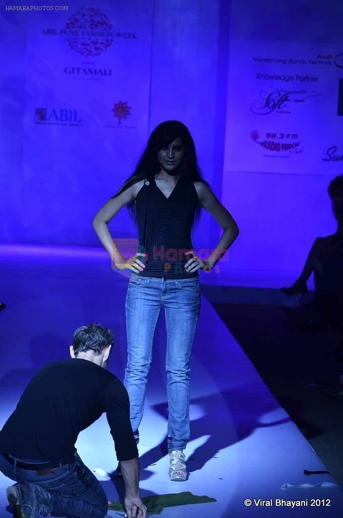 Model walk the ramp for Adam Saaks show presented by PushpGanga at ABIL Pune Fashion Weekon 13th April 2012