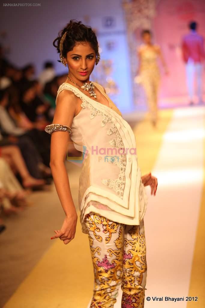 Model walk the ramp for Nivedita Saboo Show at ABIL Pune Fashion Weekon 14th April 2012