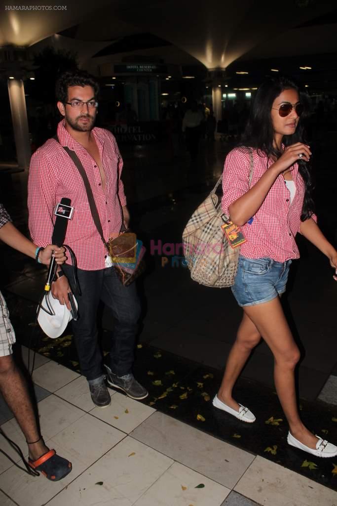 Sonal Chauhan and Neil Mukesh snapped at the airport in Mumbai on 24th June 2012