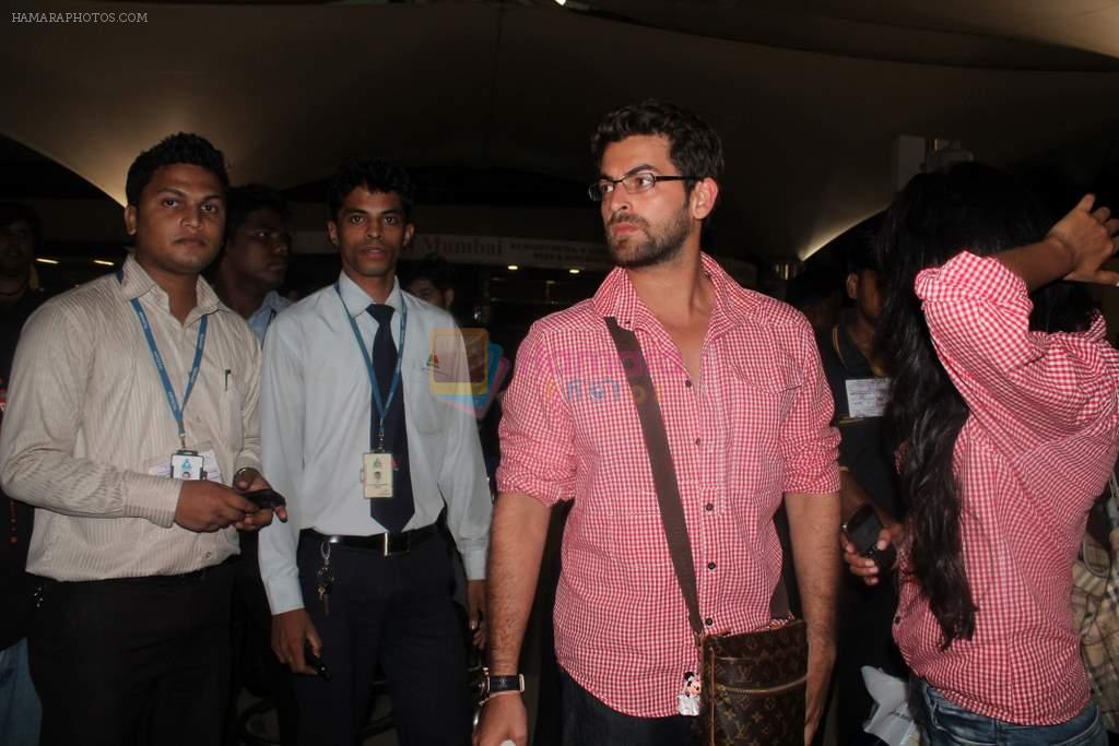 Sonal Chauhan and Neil Mukesh snapped at the airport in Mumbai on 24th June 2012