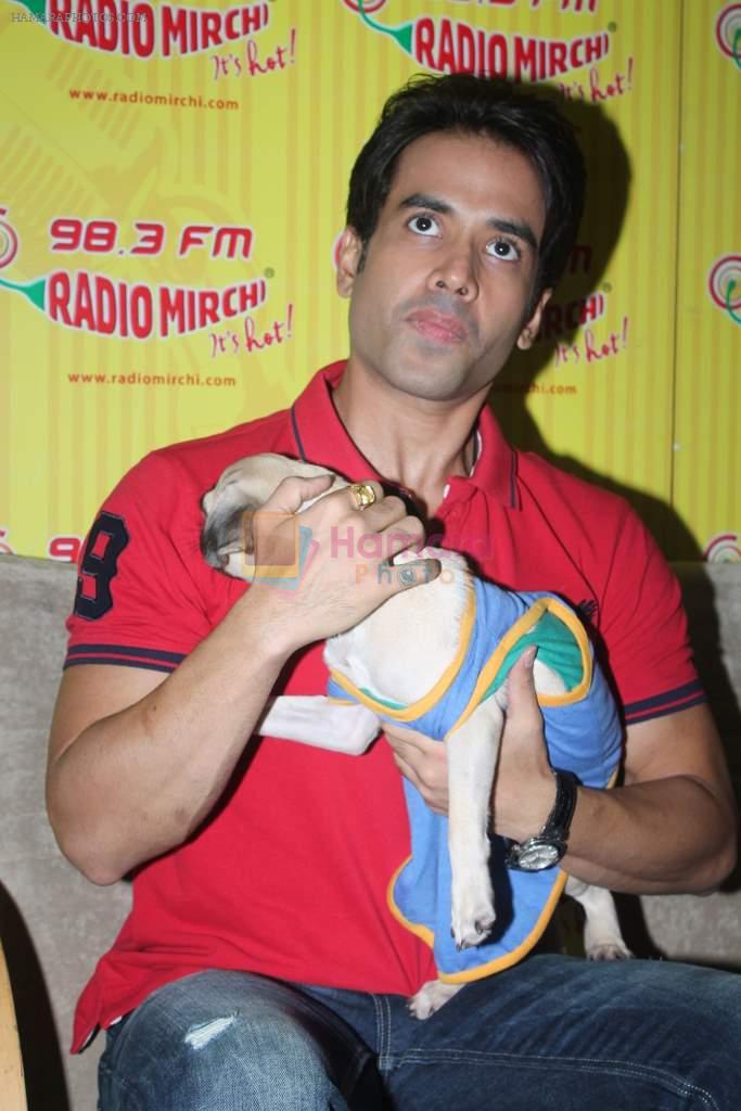 Tusshar Kapoor with dog Macho on the sets of Radio Mirchi to promote Kya Super Kool Hain Hum in Lower parel, Mumbai on 25th June 2012