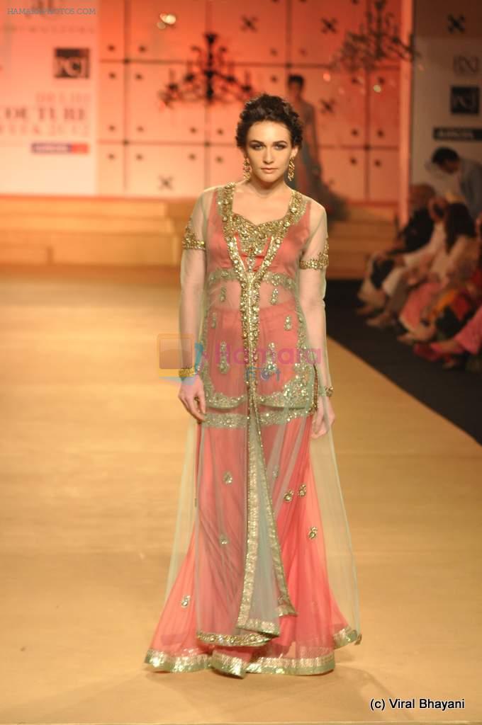 Model walk the ramp for Ashima Leena show at PCJ Delhi Couture Week on 9th Aug 2012