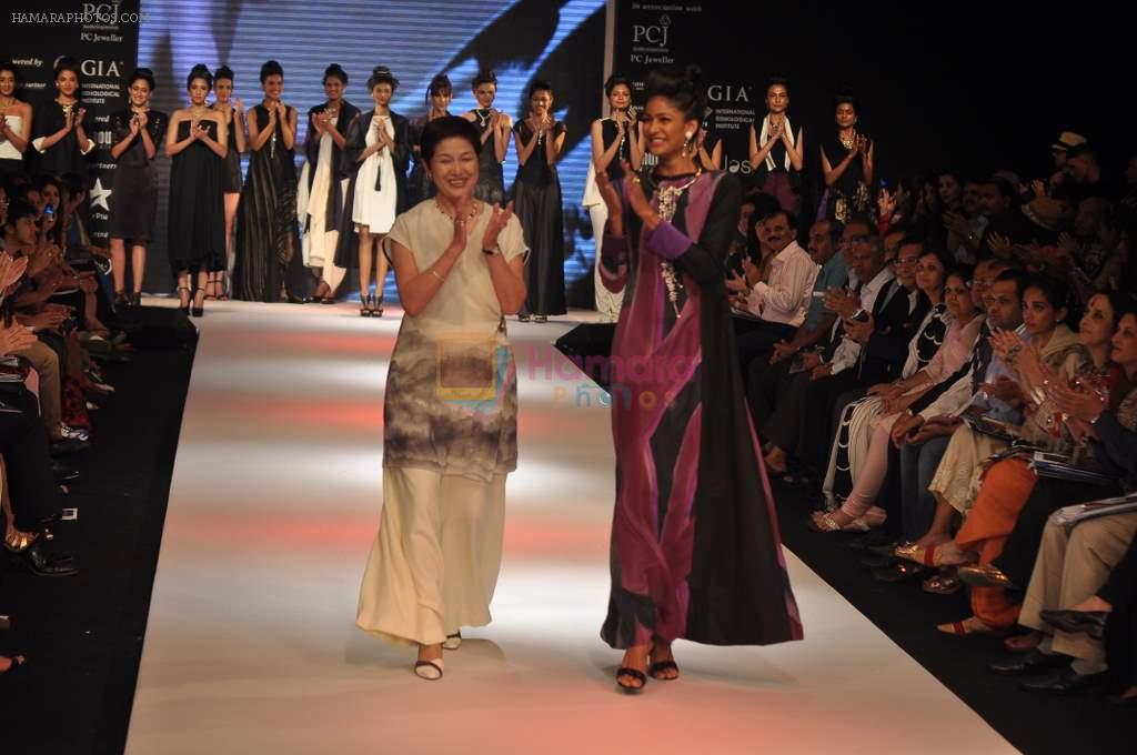 Model walks the ramp for Infinity Creation-Japan Show at IIJW Day 3 on 21st Aug 2012
