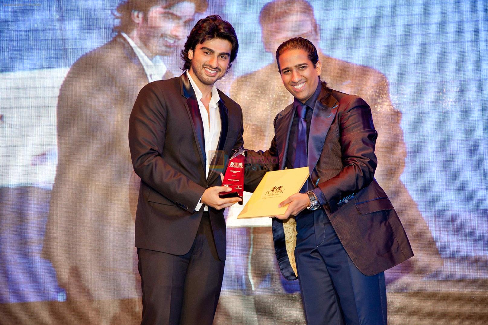 Prof. Chaudhuri awarding Arjun Kapoor at the launch of PowerBrands Rising Stars 2012-13 in Dubai on 29th Aug 2012