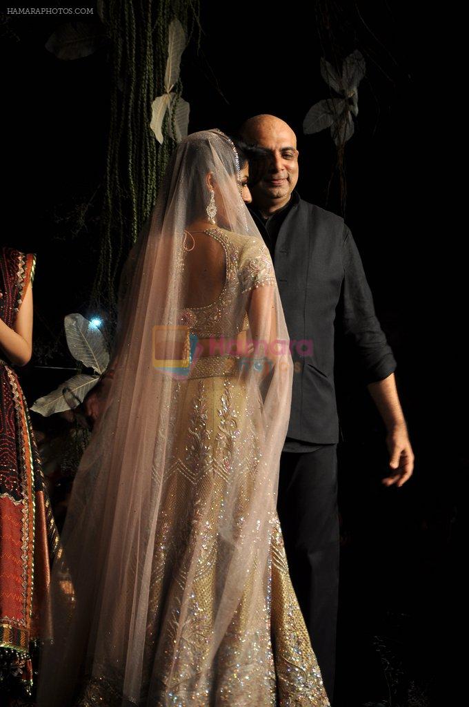 Model walks the ramp for Tarun Tahiliani show on the opening day of the Aamby Valley India Bridal Fashion Week 2012 on 12th Sept 2012