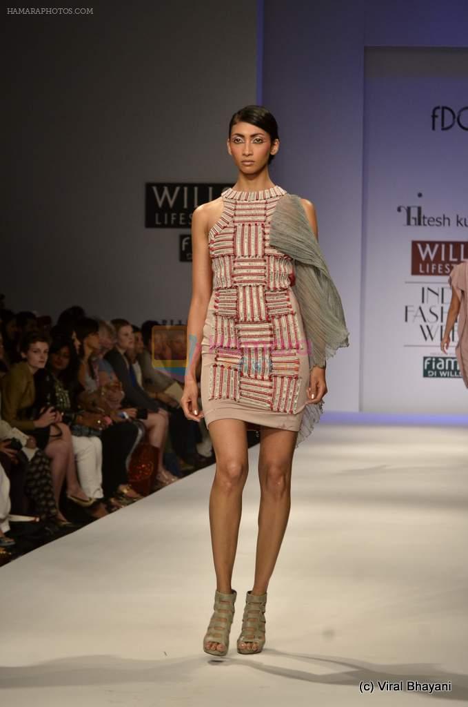 Model walk the ramp for Ritesh Kumar Show at Wills Lifestyle India Fashion Week 2012 day 4 on 9th Oct 2012