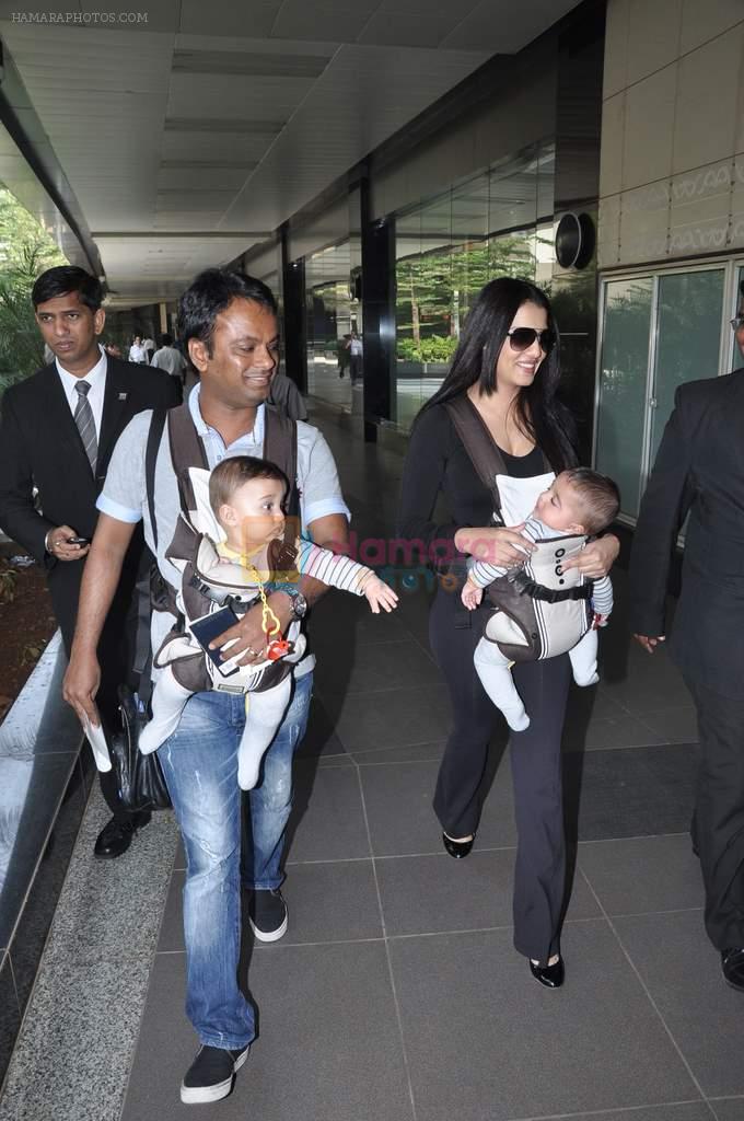 Celina Jaitley snapped with her twins at airport in Mumbai on 18th Oct 2012