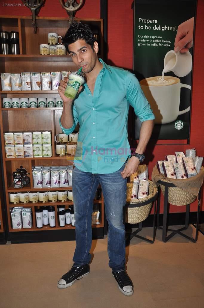Siddharth Malhotra at Student of the year launch Starbucks new shop in Mumbai on 24th Oct 2012